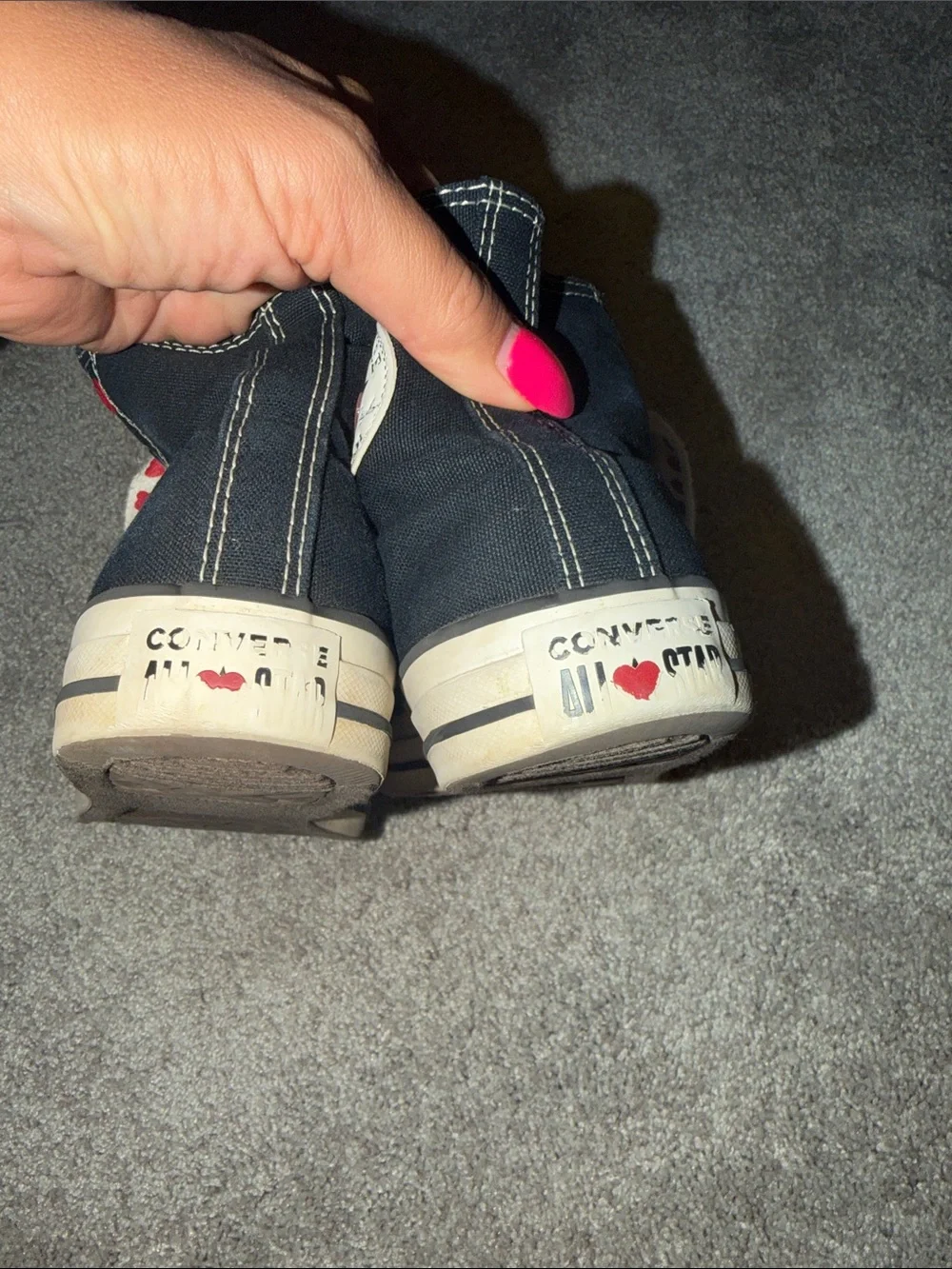 Converse Black High-Top Sneakers with Red Heart Laces